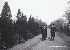 Two men walking in the Castle Park, Landskrona, Sweden, 1900. Artist: Borg Mesch