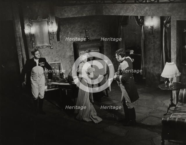 Two men and woman in evening dress, 1938. Creator: Unknown.