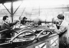 Two men at work on the production line, Cubitt factory, c1920-c1921