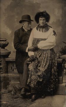 Two Men, One Dressed in Women's Attire, Holding Hands, 1870s-80s. Creator: Unknown