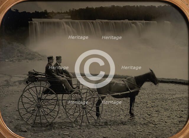 Two Men Seated in a Horse-Drawn Carriage in Front of Niagara Falls, 1860s. Creator: Unknown.