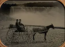 Two Men Seated in a Horse-Drawn Carriage in Front of Niagara Falls, 1860s. Creator: Unknown