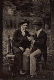 Two Men Seated on a Bench, One with His Hand on the Leg of the Other, 1870s-80s. Creator: Unknown