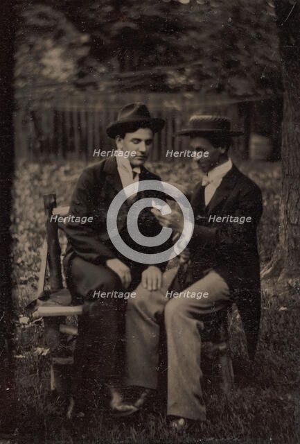 Two Men Seated on a Bench, One with His Hand on the Leg of the Other, 1870s-80s. Creator: Unknown.