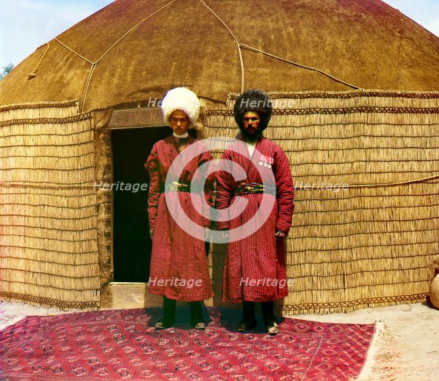 Two men standing on a rug, in front of yurt, between 1905 and 1915. Creator: Sergey Mikhaylovich Prokudin-Gorsky.