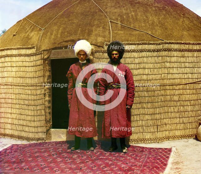 Two men standing on a rug, in front of yurt, between 1905 and 1915. Creator: Sergey Mikhaylovich Prokudin-Gorsky.