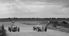 Two MGs racing at Brooklands, Surrey, c1930s. Artist: Bill Brunell