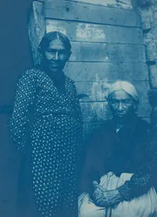 Two Native American women, posed, on Mackinac Island, 1903. Creator: Frances Benjamin Johnston