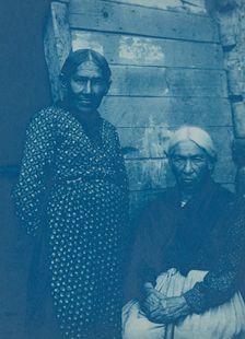 Two Native American women, posed, on Mackinac Island, 1903. Creator: Frances Benjamin Johnston
