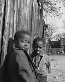 Two Negro boys, Washington (southwest section), D.C., 1942. Creator: Gordon Parks
