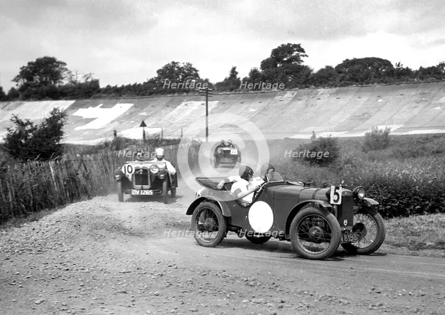 Two Austin Ulsters leading an MG, JCC Members Day, Brooklands, 4 July 1931. Artist: Bill Brunell.