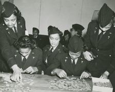 Two African American Lieutenants of the Women's Army Corps sitting at a table and..., 1939 - 1945. Creator: Unknown
