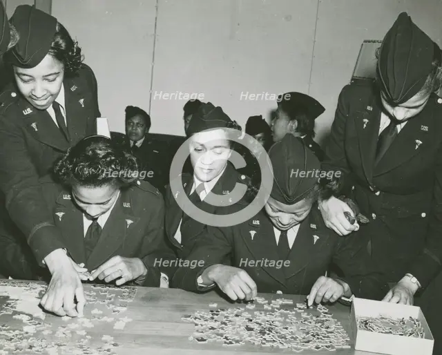 Two African American Lieutenants of the Women's Army Corps sitting at a table and..., 1939 - 1945. Creator: Unknown.
