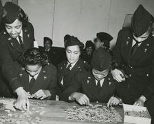 Two African American Lieutenants of the Women's Army Corps sitting at a table and..., 1939 - 1945. Creator: Unknown