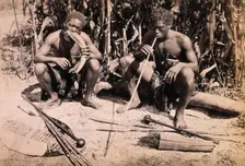 Two African men smoking pipes, 19th century. Creator: Unknown
