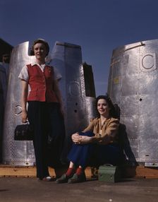 Two assembly line workers at the Long Beach, Calif., plant of Douglas Aircraft Company..., 1942. Creator: Alfred T Palmer