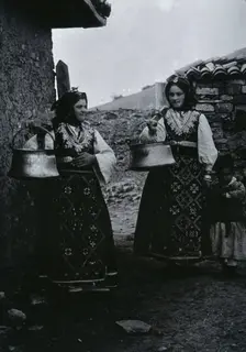 Two Bulgarian women with a child wearing national dress, c1900. Creator: Unknown