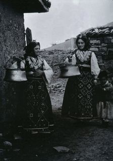 Two Bulgarian women with a child wearing national dress, c1900. Creator: Unknown