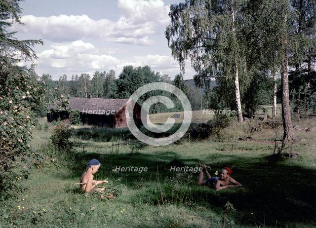 Two boys in the countryside during their summer holidays, Sweden, 1950s. Artist: Karl Sandels