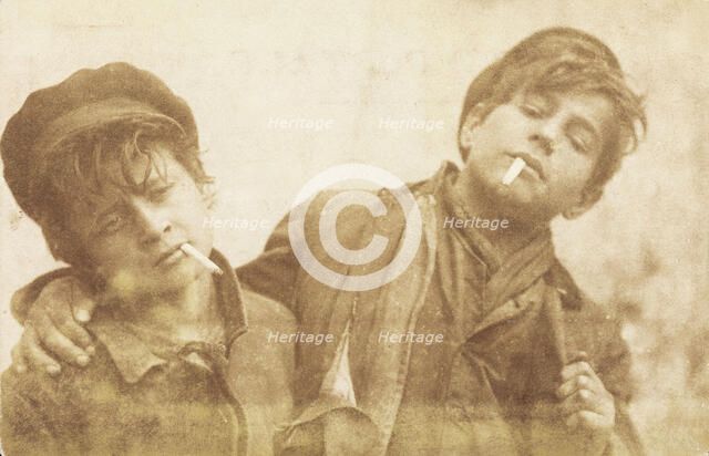 Two boys posing with cigarettes, [between 1900 and 1909?]. Creator: A Caggiano.