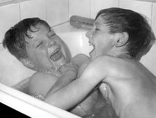 Two boys playing in the bath, Horley, Surrey, c1960-1979(?)