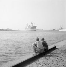 Two boys watching shipping in the harbour of Landskrona, Sweden, 1956. Creator: Unknown