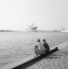 Two boys watching shipping in the harbour of Landskrona, Sweden, 1956