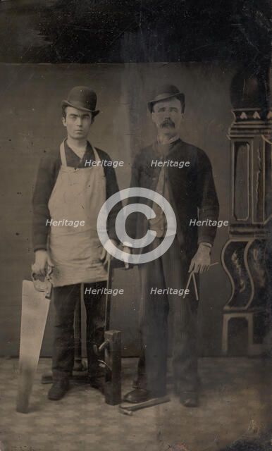 Two Carpenters with a Handsaw, Wood Plane, Hammer, Compass, and Square, 1880s. Creator: Unknown.