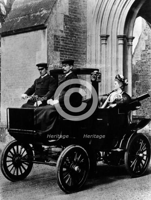 Two chauffeurs driving a convertible City and Suburban electric car. Artist: Unknown