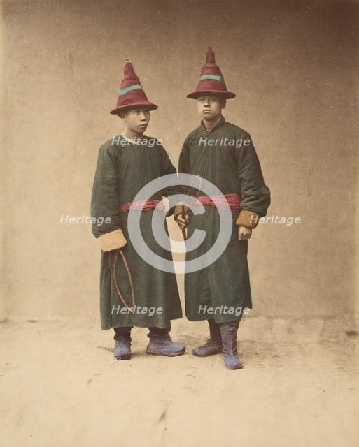 [Two Chinese Men in Matching Traditional Dress], 1870s. Creator: Baron Raimund von Stillfried.