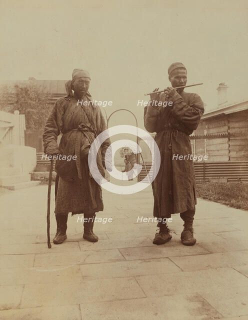 Two Chinese musician street performers in the upper yard, Dom Smith, Vladivostok, Russia, 1899. Creator: Eleanor Lord Pray.