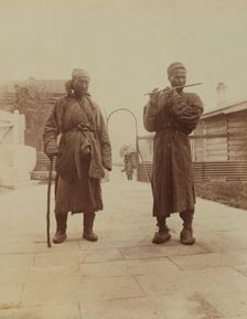 Two Chinese musician street performers in the upper yard, Dom Smith, Vladivostok, Russia, 1899. Creator: Eleanor Lord Pray