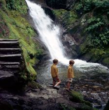 Two children at a pool, Dolgoch falls, Tal-y-llyn Valley, Snowdonia National Park, Wales, 1969. Creator: Michael Walters