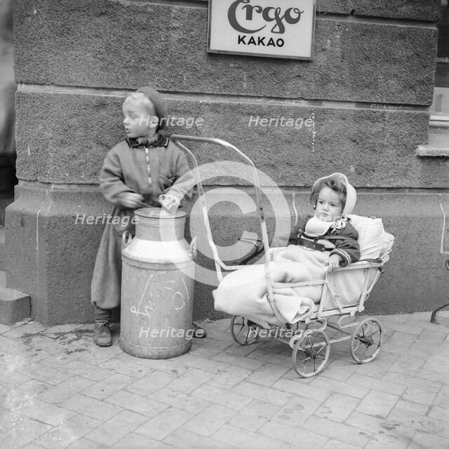 Two children in the street, Sweden. Artist: Unknown
