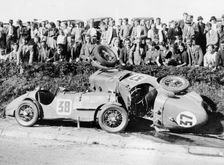 Two crashed cars from the Singer Nine team, possibly at a TTrace, 1935