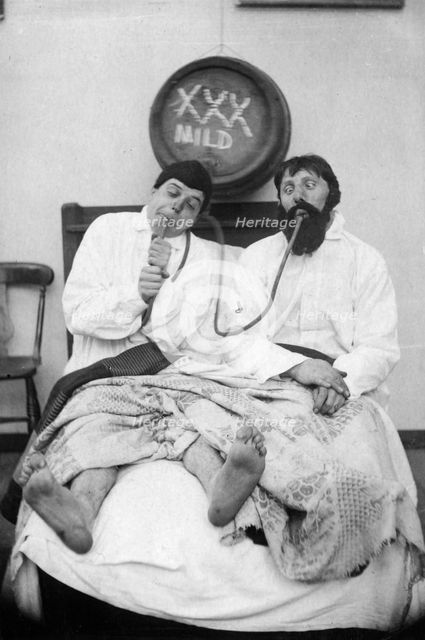 Two drunken men in a bed, 1906. Artist: Unknown
