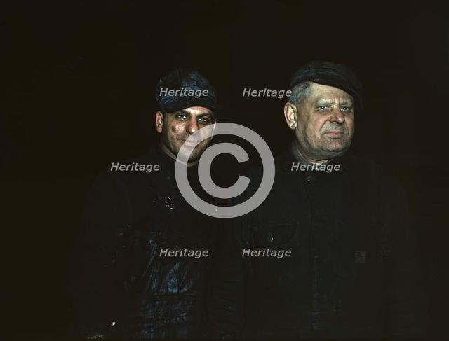 Two employees at the roundhouse at Proviso yard, C & NW RR, Chicago, Ill., 1942. Creator: Jack Delano.