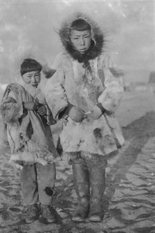 Two Eskimo boys on a windy day, between c1900 and 1916. Creator: Unknown