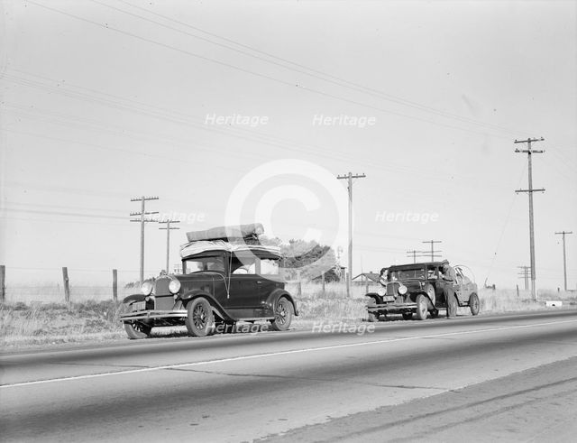 Two families originating from Independence, Kansas, U.S. 99, between Tulare and Fresno, 1939. Creator: Dorothea Lange.