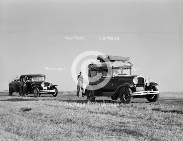 Two families originating from Independence, Kansas, US99, between Tulare and Fresno, 1939. Creator: Dorothea Lange.