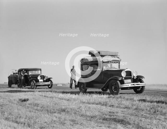 Two families originating from Independence, Kansas, US99, between Tulare and Fresno, 1939. Creator: Dorothea Lange.