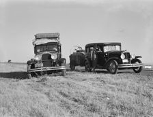 Two families originating from Independence, Kansas, on U.S. 99, between Tulare and Fresno, 1939. Creator: Dorothea Lange