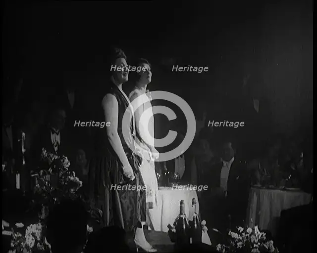Two Female Civilians Singing Together On a Stage, 1924. Creator: British Pathe Ltd.