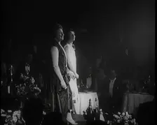 Two Female Civilians Singing Together On a Stage, 1924. Creator: British Pathe Ltd