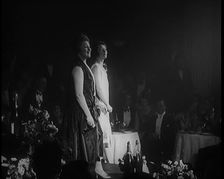 Two Female Civilians Singing Together On a Stage, 1924. Creator: British Pathe Ltd