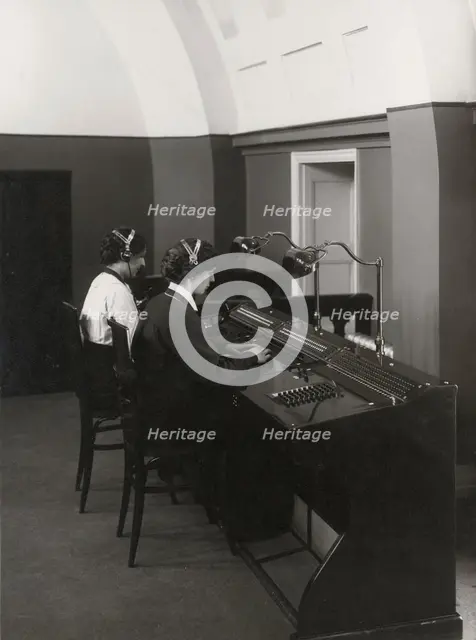 Two female operators at a Western Electric switchboard, Landskrona, Sweden, 1927. Creator: Unknown.