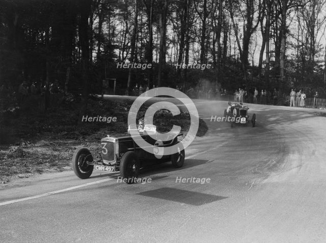 Two Frazer-Nash cars racing at Donington Park, Leicestershire, 1930s. Artist: Bill Brunell.