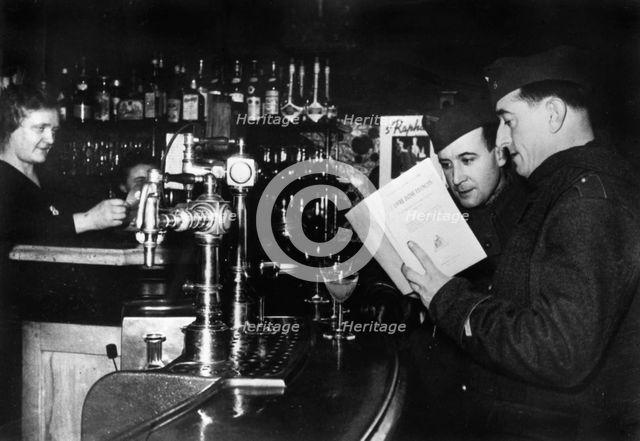 Two French soldiers on leave in a cafe, c1939-1940. Artist: Unknown