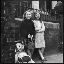 Two girls collecting pennies for the guy Westport Road, Burslem, Stoke-on-Trent, 1965-1968. Creator: Eileen Deste