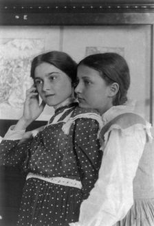 Two girls from a Washington, D.C., school on a class visit to the Library of Congress..., (1899?). Creator: Frances Benjamin Johnston
